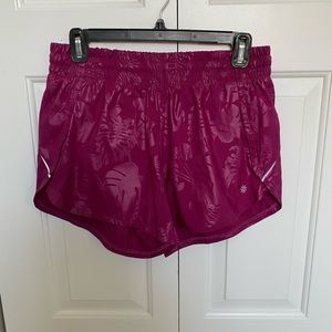 Like new!  Athleta running shorts